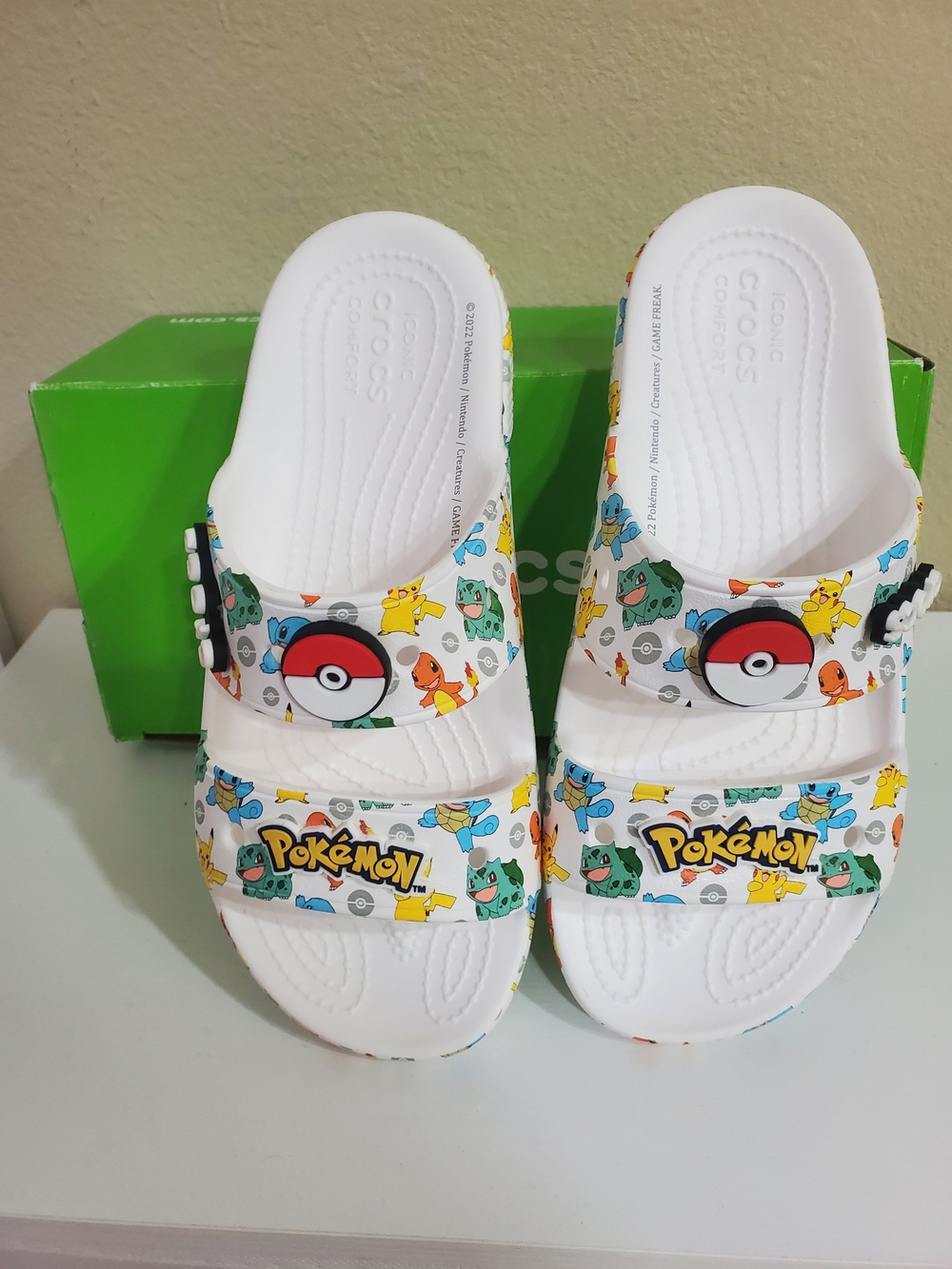 Like new Pokémon Crocs slides in excellent condition with original box.